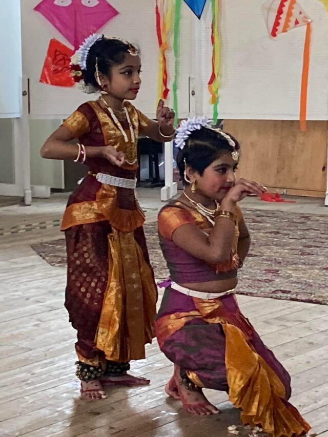 children wearing traditional dress